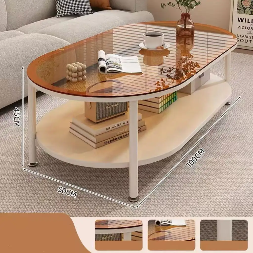 Modern cream-style coffee table, oval with corrugated glass top and two metal storage shelves