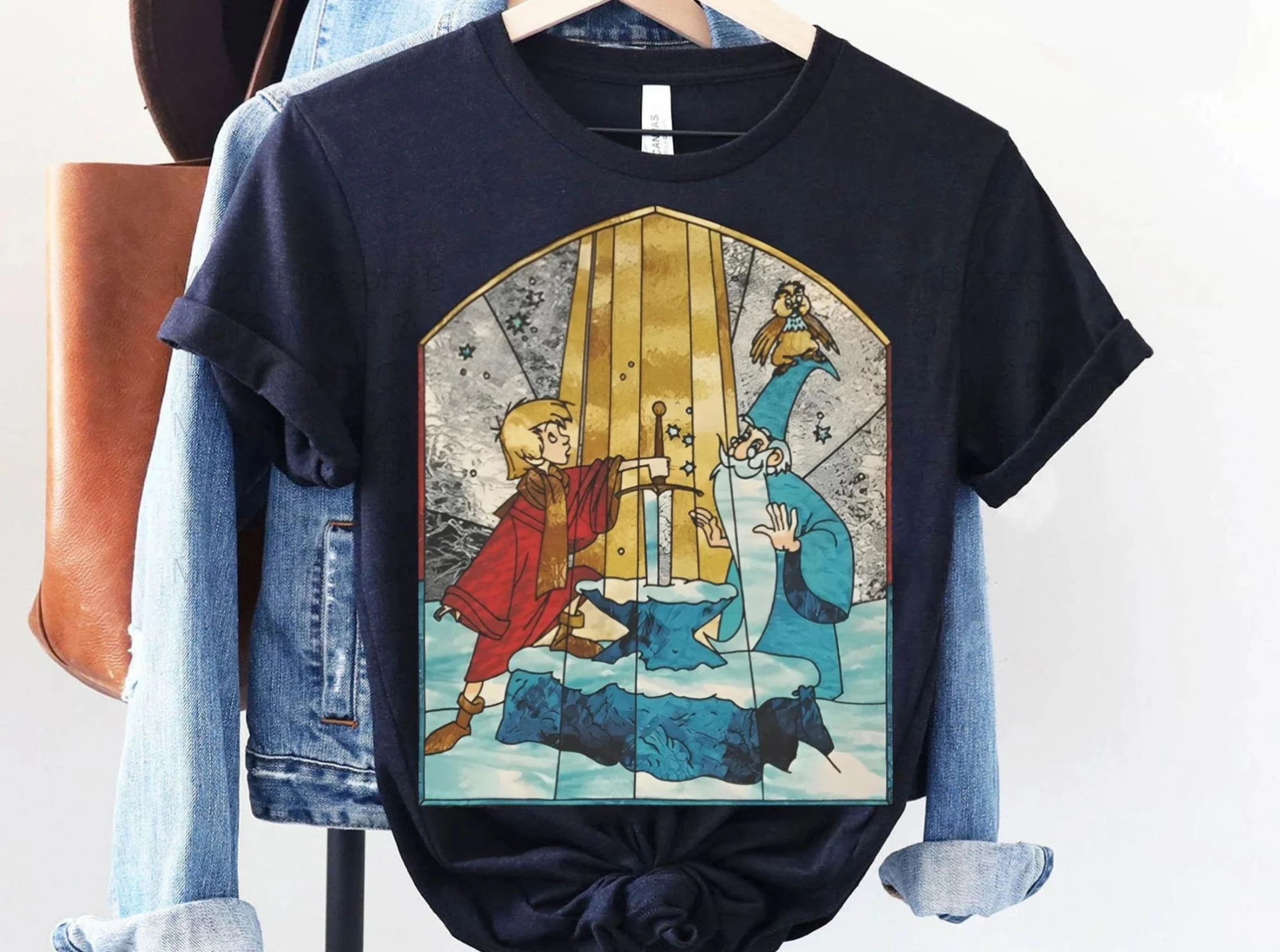 قميص ريترو آرثر و ميرلين |   السيف في تي شيرت الحجر |   تي شيرت ديزني المضحك |   ملابس رحلة ديزني لاند |   عيد ميلاد ديزني