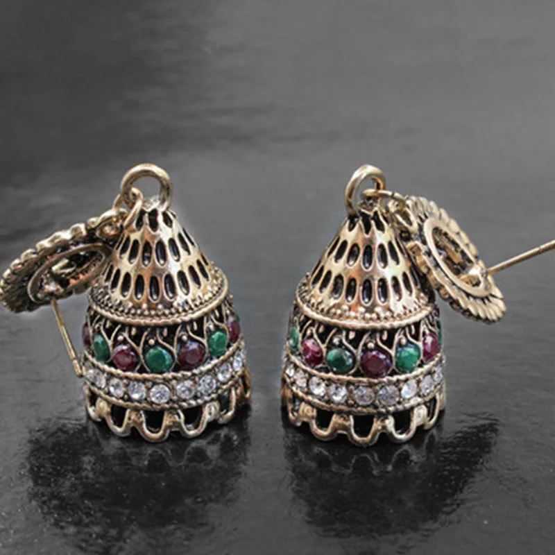 

New European and American Vintage Gold Hollow Long Bell Earrings Unique Inlaid Black Crystal Zircon Metal Pendant Earrings