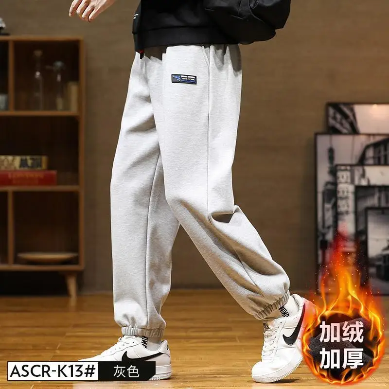 ฤดูหนาวใหม่สีทึบแฟชั่นElasticเอวSweatpants Man High Street CasualหลวมPatchworkหนาAll-Matchกางเกง