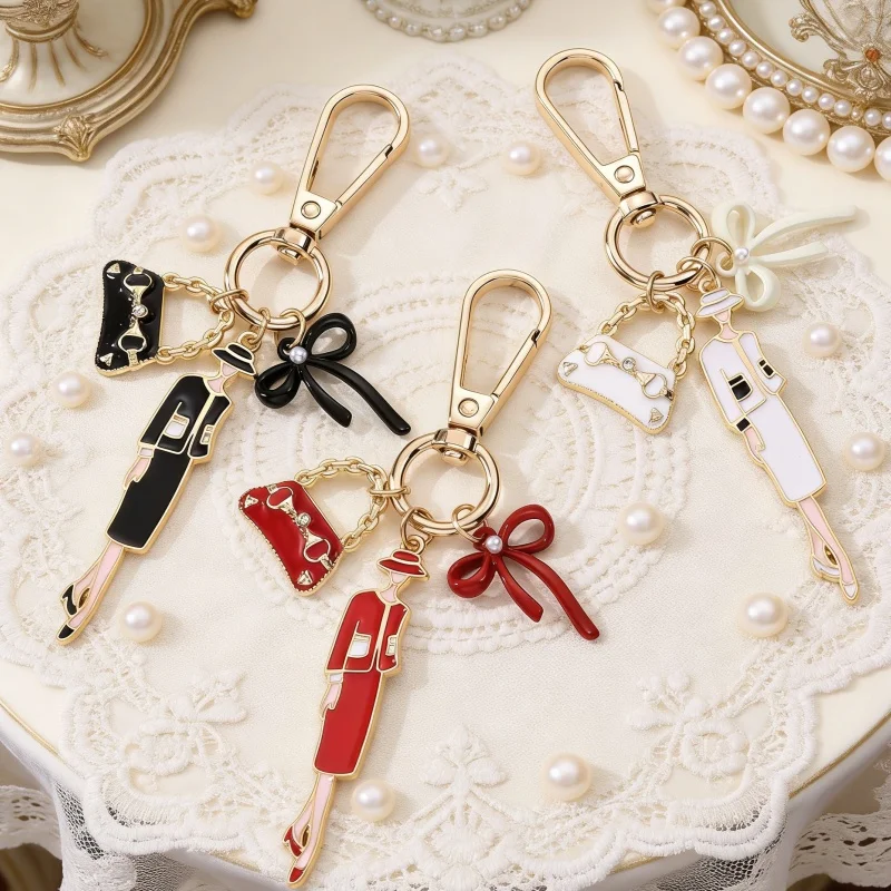 1 Stück Hübscher Handtaschen-Schlüsselanhänger mit Perlen-Schleife, Emaille-Design, Cartoon-Lipgloss-Anhänger für Damen, Tolles Geschenk
