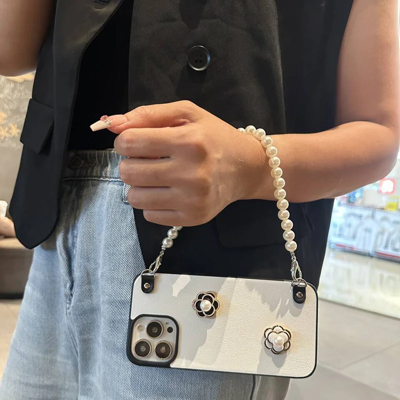 Aplicable iPhone 16 15 14 13 12 11 serie funda para teléfono móvil cuero portátil Tan Songyun Jixing mismo anti-caída