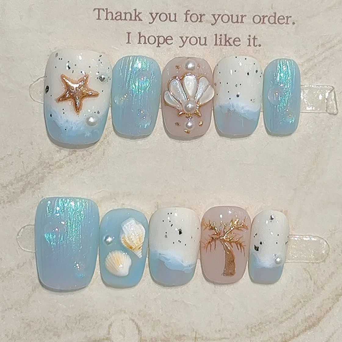 

10Pcs Blue Sea Summer Press on Nails with Hand Drawn Shell Pearl Starfish Designs Nail Art Reusable Handmade French False Nails