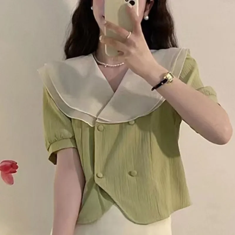 Camicia fresca a maniche corte da donna Estate 2025 Camicie con colletto alla Peter Pan in stile coreano con bordo a foglia di loto