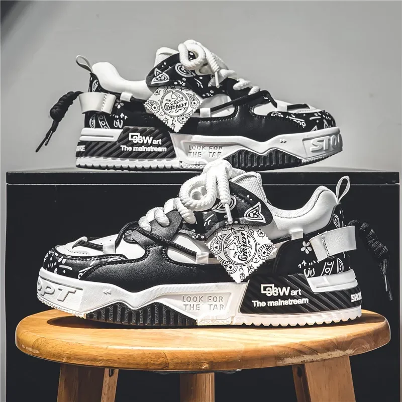 

Новые осенние мужские спортивные туфли на толстой подошве с модным дизайном, граффити и гладкой строчкой.