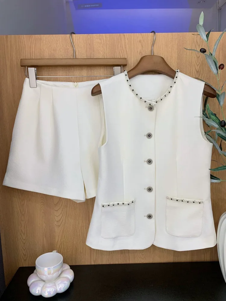 Set di due pezzi di fragranza piccola francese di alta qualità gilet Blazer estivo da donna + abiti corti elegante moda OL Set di pantaloni da 2