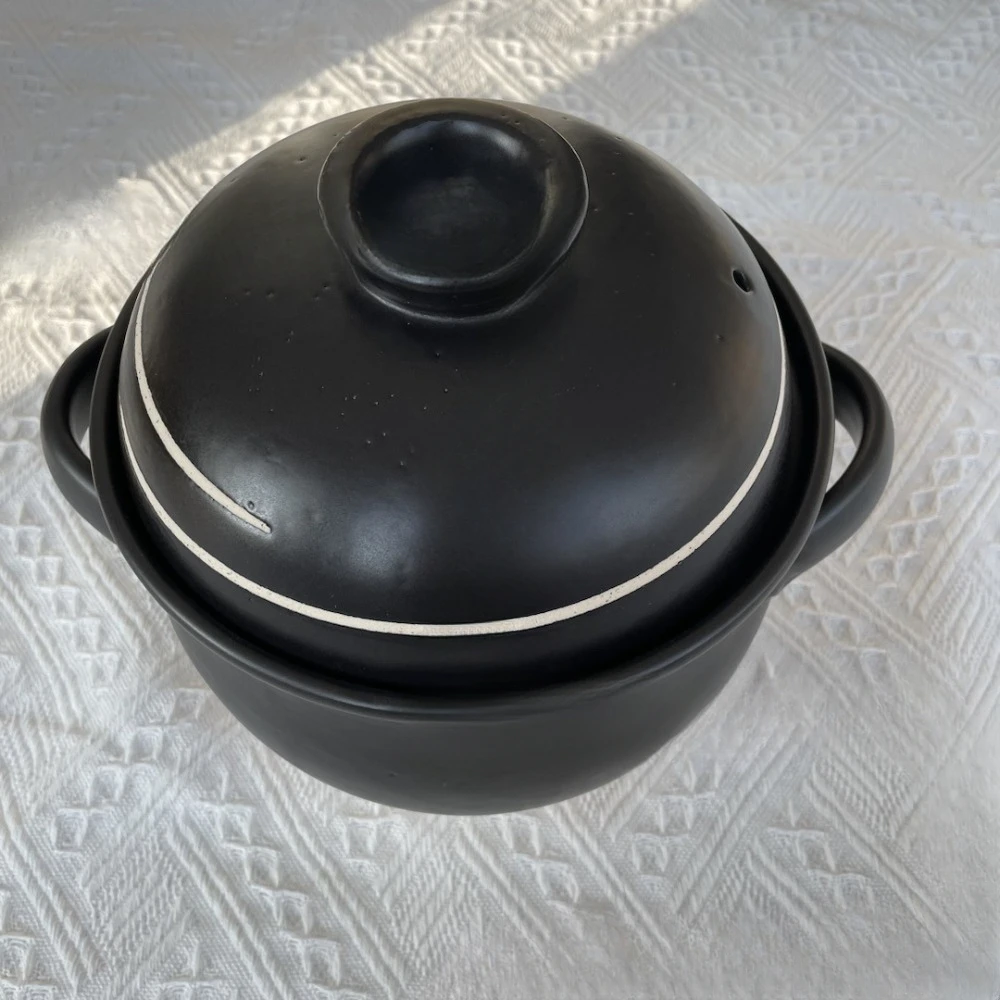 Japanese original imported Wan Gu Shao heat-resistant black double cover white glazed clay pot for household clay pot