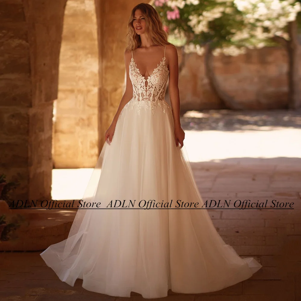 

Sexy Spaghetti Straps V Neck Wedding Dress Open Back See Through Tulle A Line Bride Dresses Vestidos De Novia Sequined Applique
