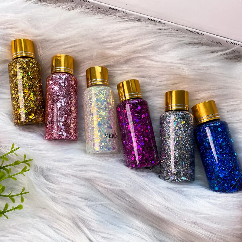 جل لامع لامع مع ترتر للوجه ومكياج لامع للجسم للشفاه والشعر، نابض بالحياة وطويل الأمد لجميع القديسين