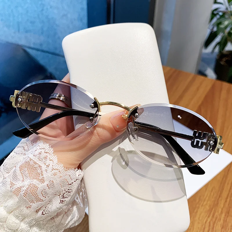 نظارات شمسية بإطار بيضاوي جديد بدون إطار بحافة مقطوعة نظارات شخصية تصميم عصري نظارات شمسية بإطار صغير 90289 #4