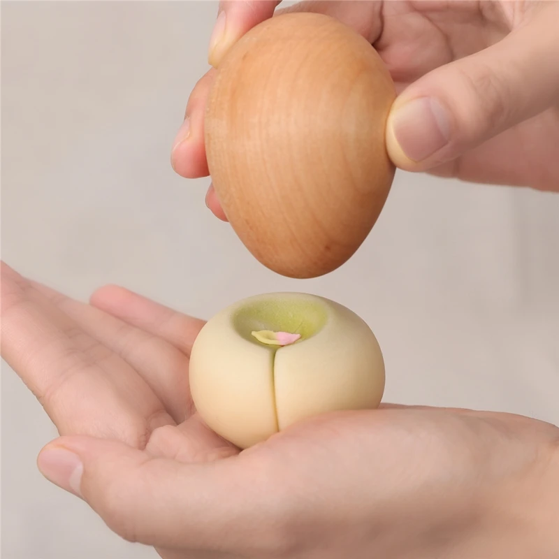 

Japanese wagashi special egg-shaped tool wooden egg-shaped mold special for pressing pit