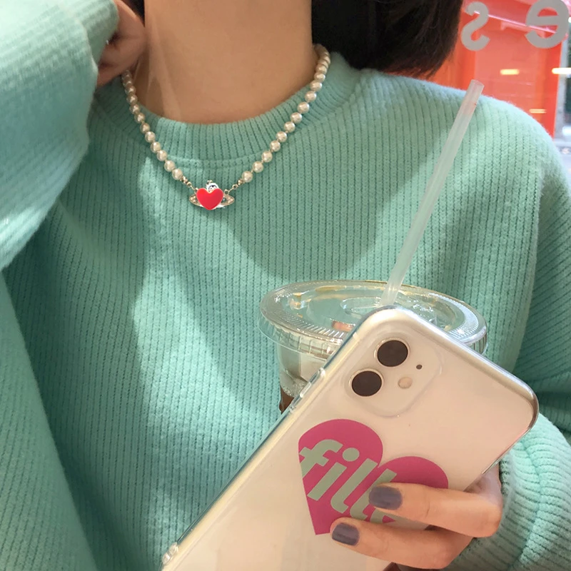 

Love Planet Stacked Pearl Necklace Women's Niche Design Sense of Light Luxury Clavicle Chain Sweater Chain