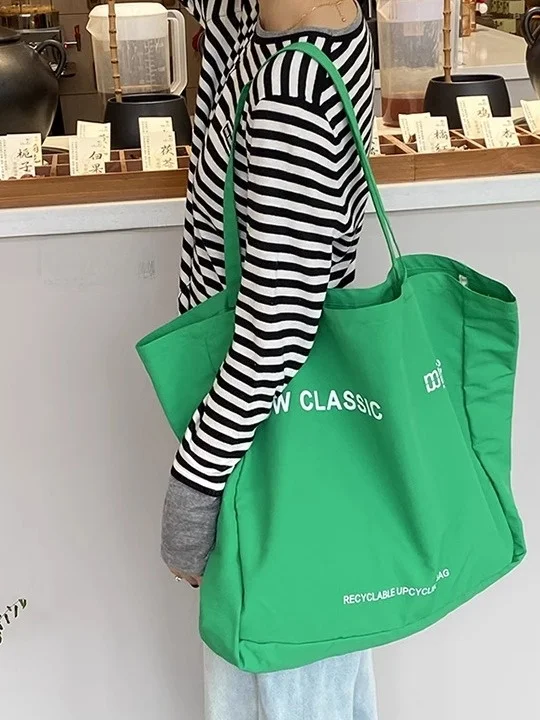 bolsa-de-lona-fina-nova-colecao-primavera-verao-2025-bolsa-de-ombro-transversal-fena-ande-capacidade-leve-para-viagem