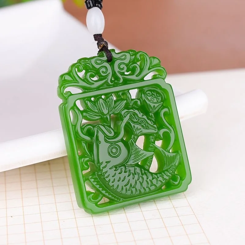 

Xinjiang Hetian jasper carp leap Longmen lotus pendant men and women jade pendant versatile