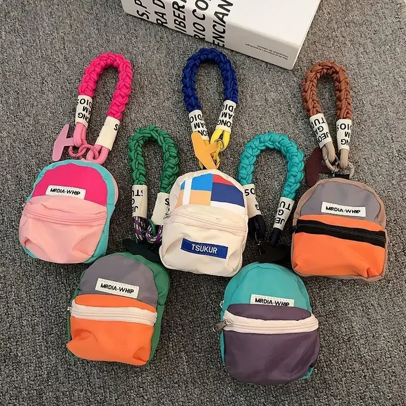 Trendy portable phone lanyard, key, twist wrist lanyard, anti-loss chain, creative coin purse, earphone storage bag