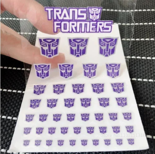 Brinquedos de transformação Anime Decepticons, Autobots, G1 Symbol Decal, Cena DIY Personalizada, Acessórios de Decoração, Boy Girl Gift