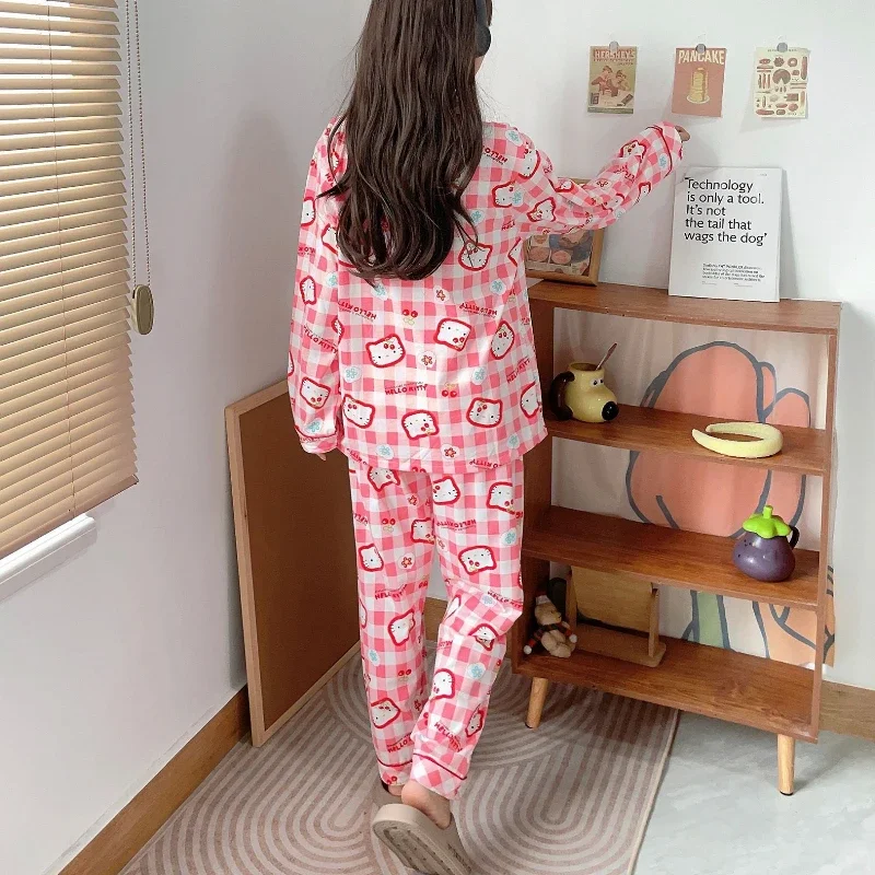 Sanrio Hello Kitty Anime pijamas de mujer lindo a cuadros pantalones de manga larga conjunto de dos piezas de primavera otoño ropa de casa cómoda suelta