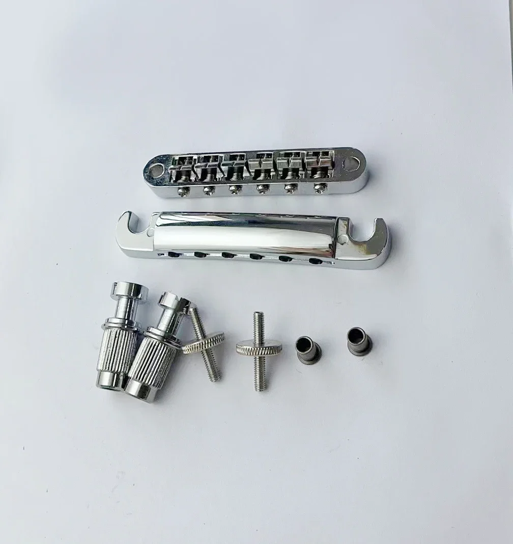 

A set of chrome strings bridge saddles bridge tail plate suitable for LP electric guitar parts accessories