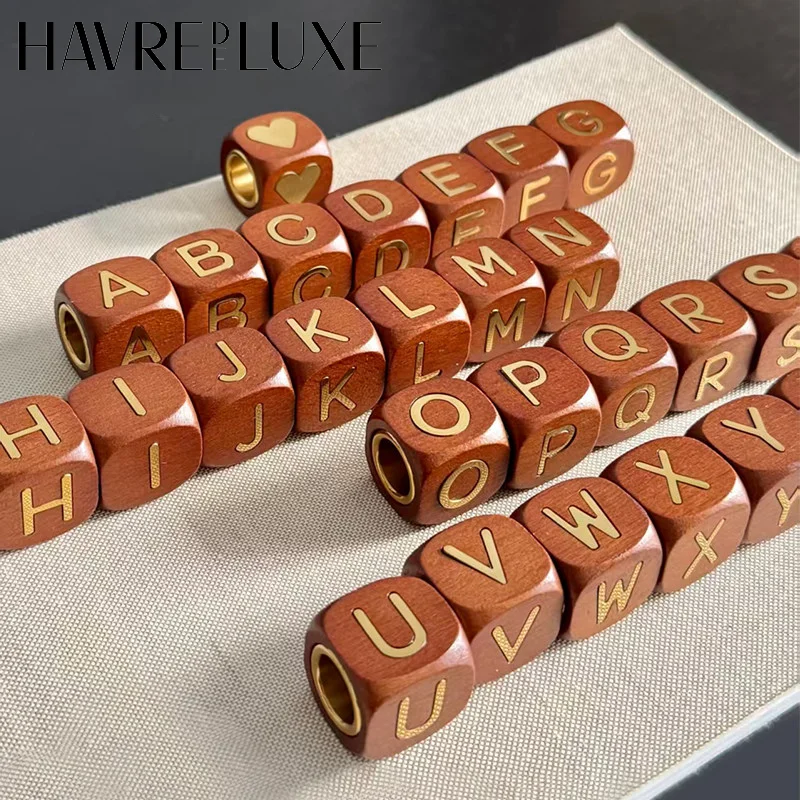 piccola-pepita-d'oro-per-decorazione-lettera-andiamo-accessori-per-sacchetto-portadadi-in-rovere-baodie-home