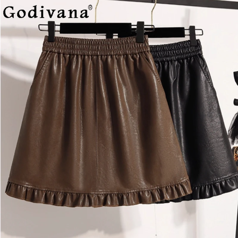 

Женская осенняя новинка большого размера с эластичной резинкой на талии, свободная модная кожаная юбка с оборками, универсальные корейские короткие юбки трапециевидной формы, уменьшающие возраст