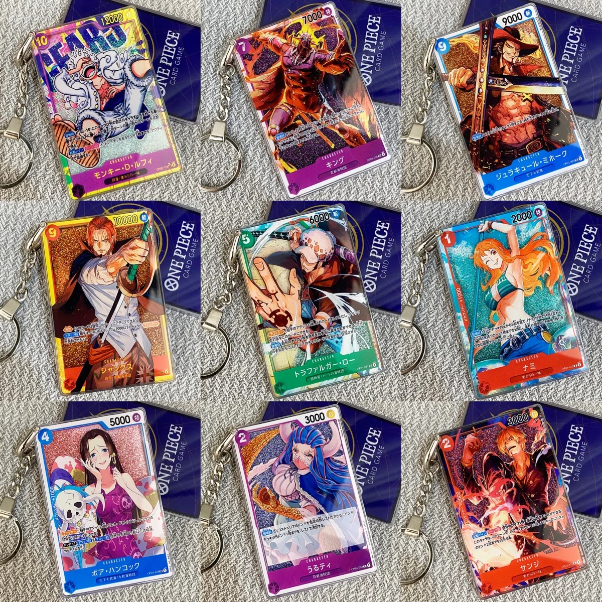 

Новый брелок-карточка One Piece с персонажами: Монки Д. Луффи, Трафальгар Лоу, Нами, Шанкс. Аниме-брелок-карточка OPCG. Декоративный подарок.