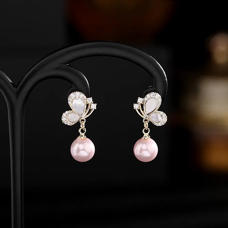 Design Sense Earrings Small Shell Pearl Earrings s925 Silver Needle Short Zircon Butterfly Earrings for Women