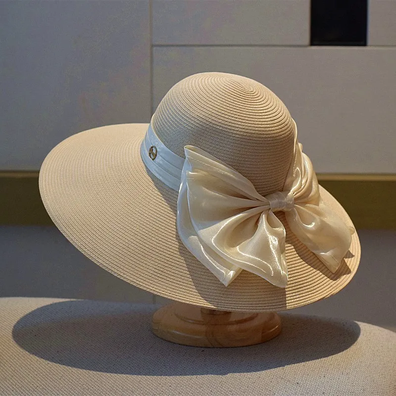 

Hepburn style large brim bow fisherman hat female sunshade basin makes the face smaller