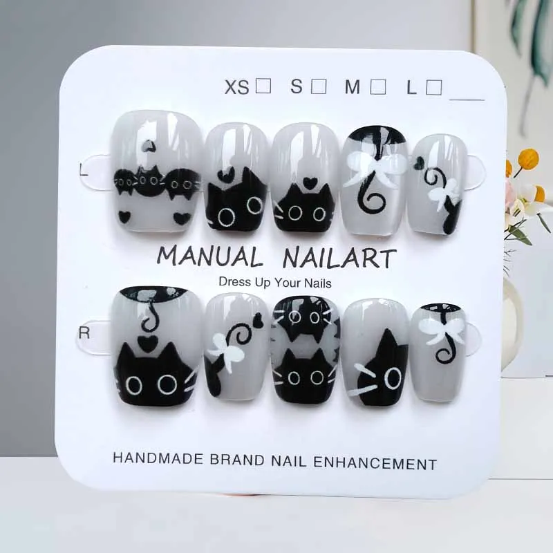 10枚入り 可愛い漫画 黒猫とピンクの蝶結び ハンドメイド つけ爪 スクエアヘッド ネイルパッチ キャットアイ ネイルスライス 付け爪 ネイルアート