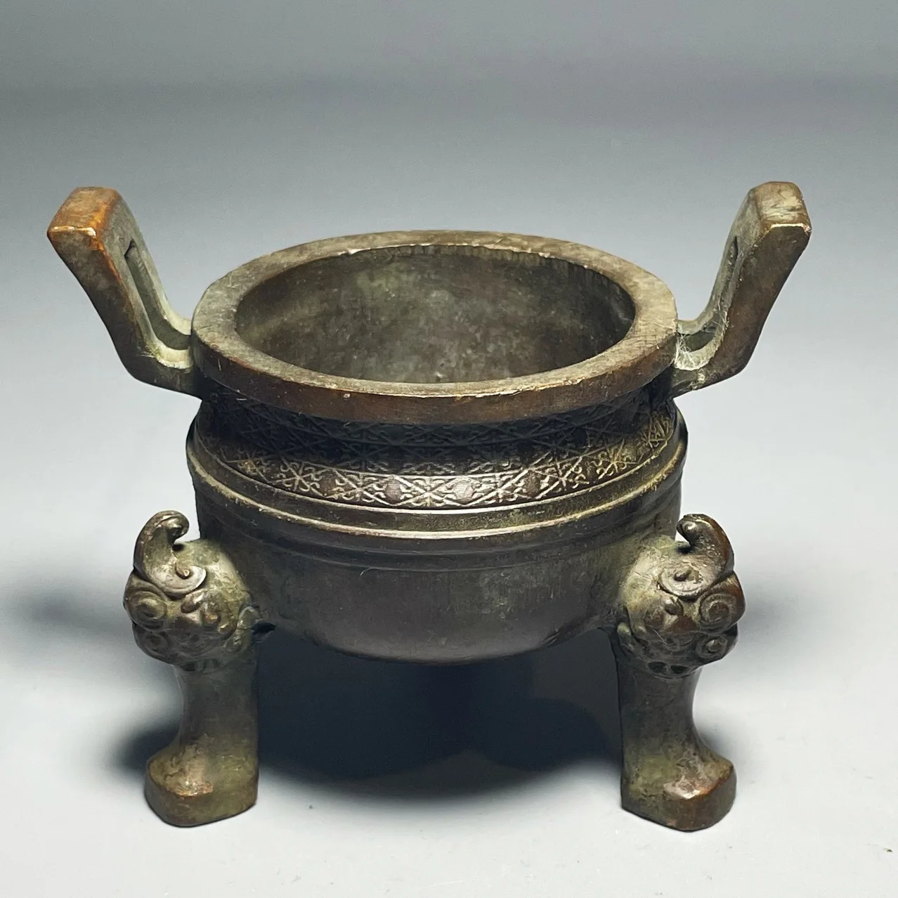 Ancient bronze incense burner, three-legged animal-patterned incense burner decoration opened in ancient Western Zhou Dynasty.