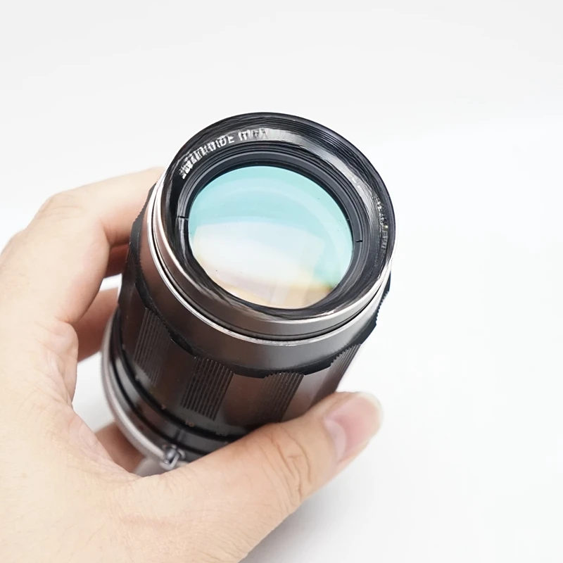 Manual MC multi-layer coating for mid-focus prime lenses