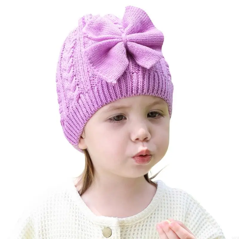 Cappello lavorato a maglia in unita Cappello lavorato a maglia con fiocco per bambini Casual all'aperto Autunno e inverno