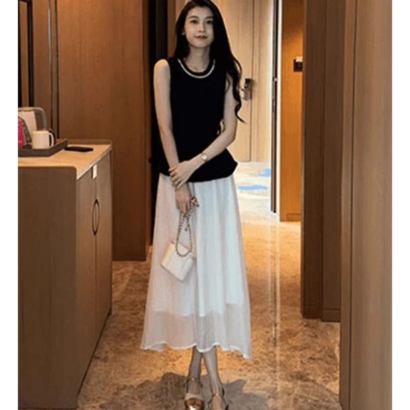 Camisas sin mangas negras elegantes para mujer, faldas de gasa, trajes de dos piezas, camisetas sin mangas negras ajustadas para verano 2025, trajes de faldas