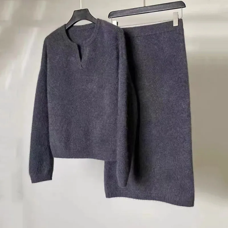 Autumn and winter new fashionable knitted women's clothing V-neck loose knitted sweater+half skirt two-piece set