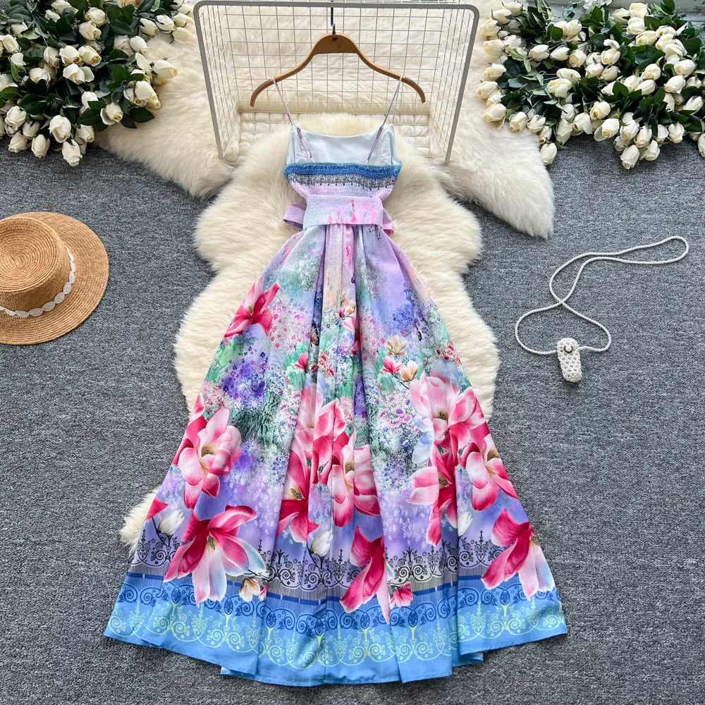 Clothlandผู้หญิงElegant Floralพิมพ์Camiชุดสปาเก็ตตี้สายรัดBackless Sashes Retro MidiชุดMujer QE127