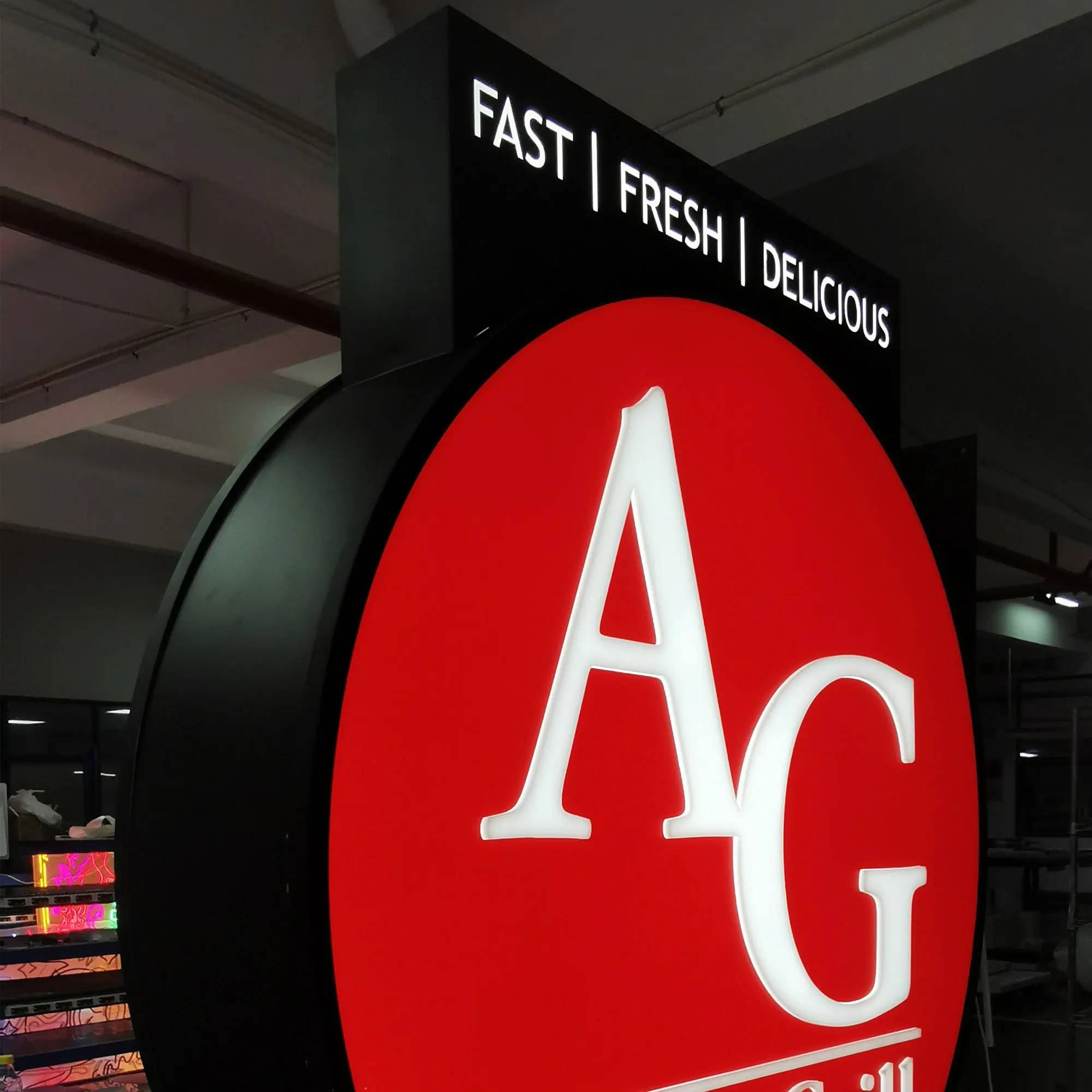 Red vinyl applied with acrylic push through double face light free standing cabinet sign