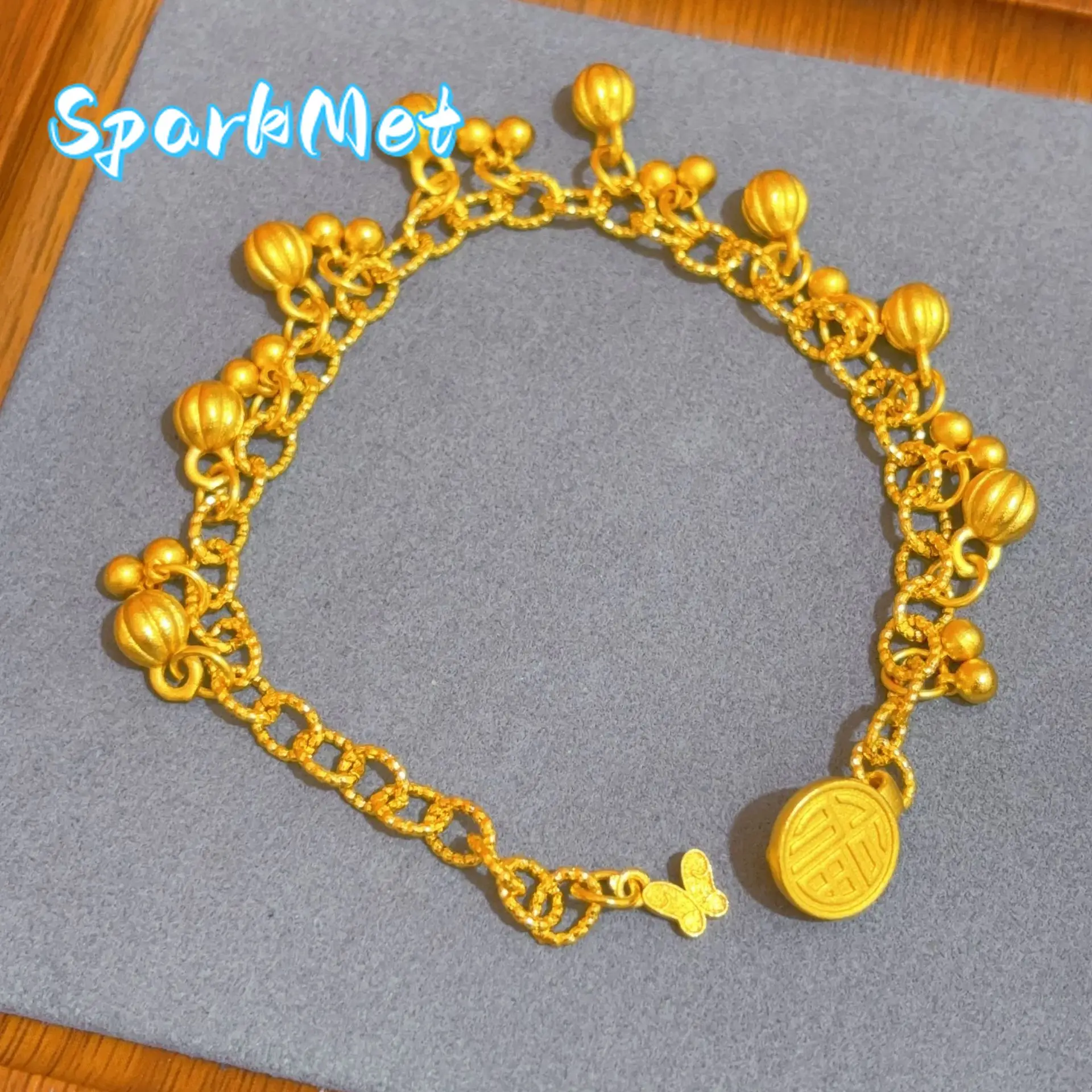 

Женский браслет Sparkmet из 24-каратного золота (AU999) с экзотическим фруктом-колокольчиком | Градиентный матовый колокол, с эффектом ковки и эмалевым узором