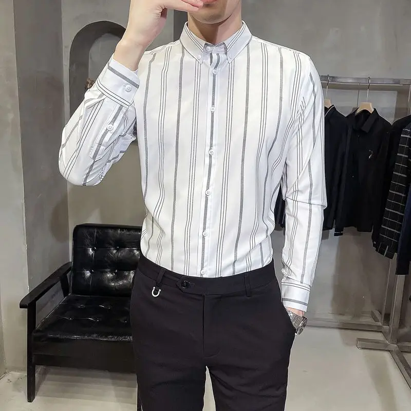 Camisas holgadas informales de negocios a la moda para hombres, ropa Formal de manga larga con cuello vuelto y botones a rayas, cómoda para