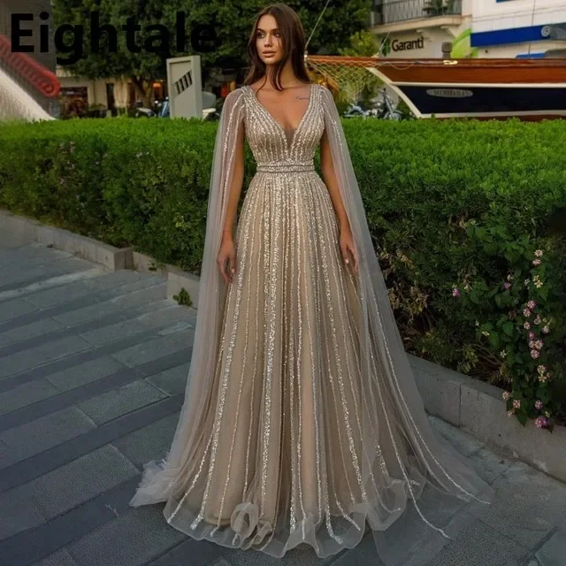 

Vintage A Line Shinning V Neck Long Evening Dresses For Wedding Party Luxury Sequined Formal Dubai Prom Dress With Cape