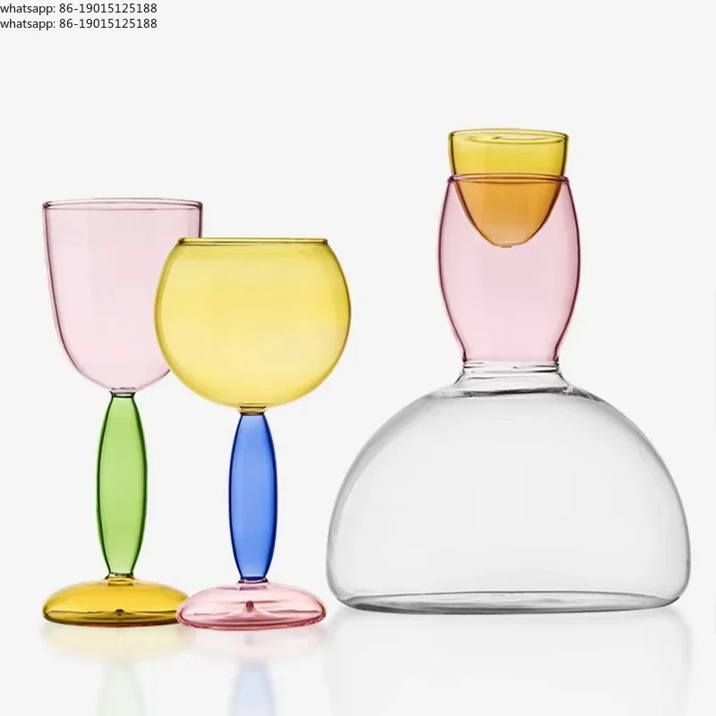 Handmade colored glass cups, creative champagne glasses, contrasting Bordeaux Burgundy red wine glasses, decanter