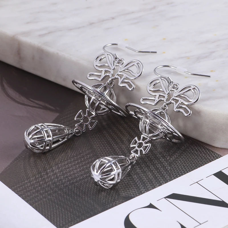 أقراط على شكل فيونكة مجوفة من HQ للسيدات من النحاس المطلي بالذهب بتصميم قطرات الماء أقراط عصرية مخصصة إكسسوارات فاخرة هدايا