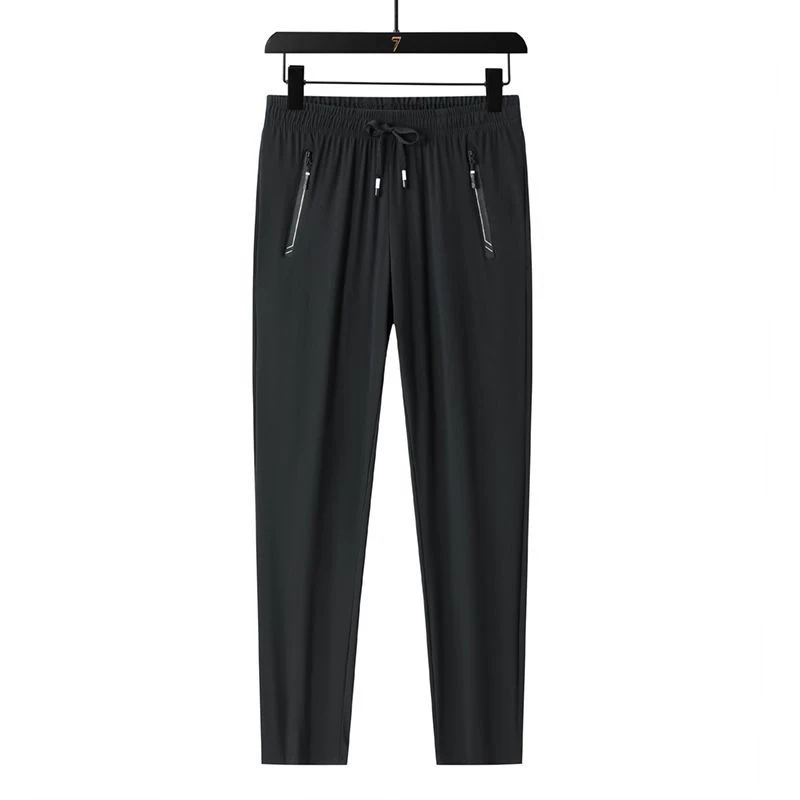 Wiosenne letnie męskie sznurowane spodnie dresowe Homme w pasie legginsy na wszystkie mecze sportowe spodnie męskie wygodne proste spodnie