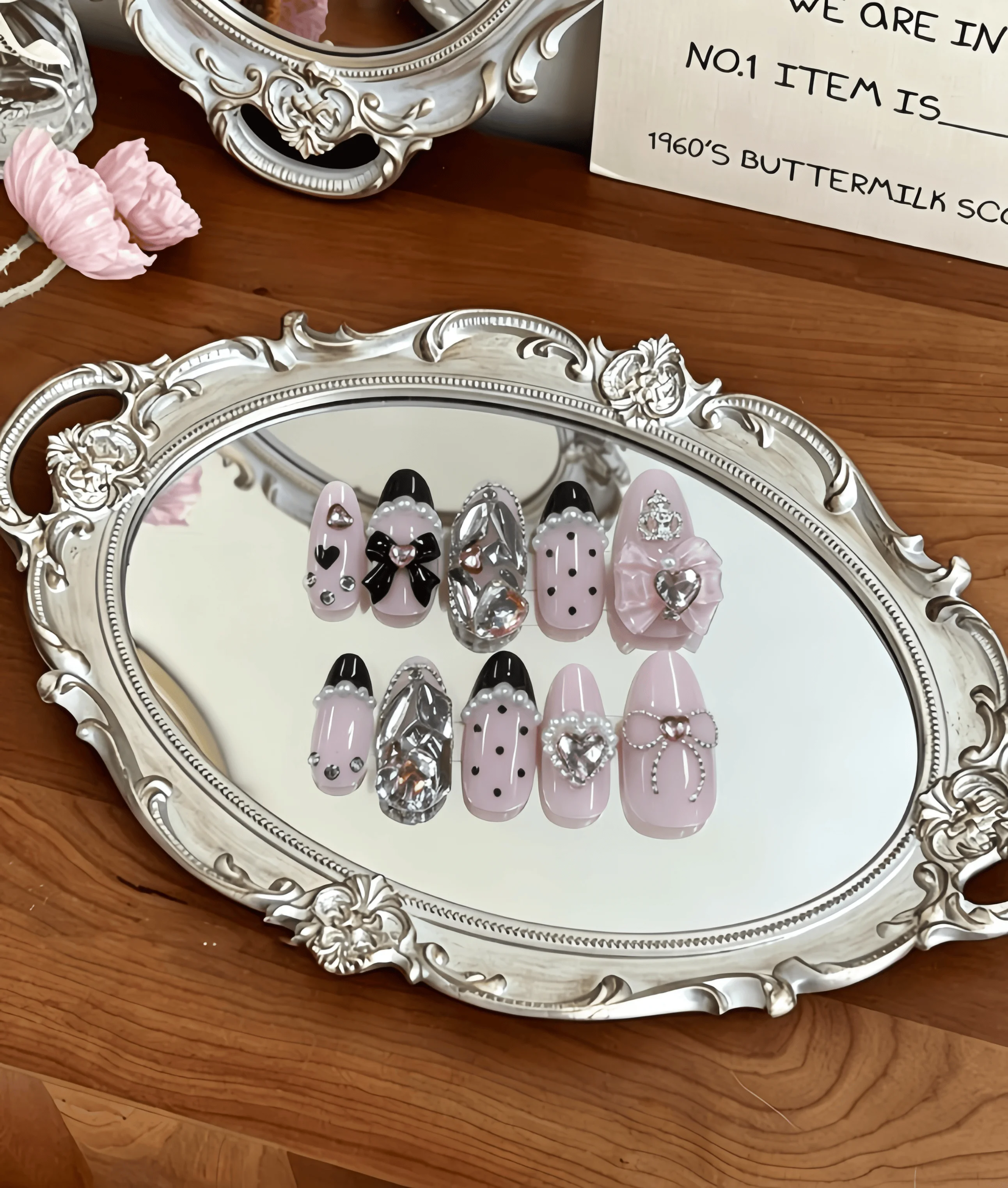 10 Pieces of Almond-Shaped Medium-Length Pink and Black Color-Blocked Lolita Press-On Nails, in a Sweet and Cool Princess Style, Featuring Polka Dots, Bows, and Heart-Shaped Rhinestones, with a Nude Pink Base Color and 3D Rhinestone Decoration Technique, Suitable for Summer Vacations, Ideal for Sweet Girls and Lolita Enthusiasts, Perfect for Dates, Comic Conventions, and Birthday Parties, Comes with Jelly Glue and Nail File