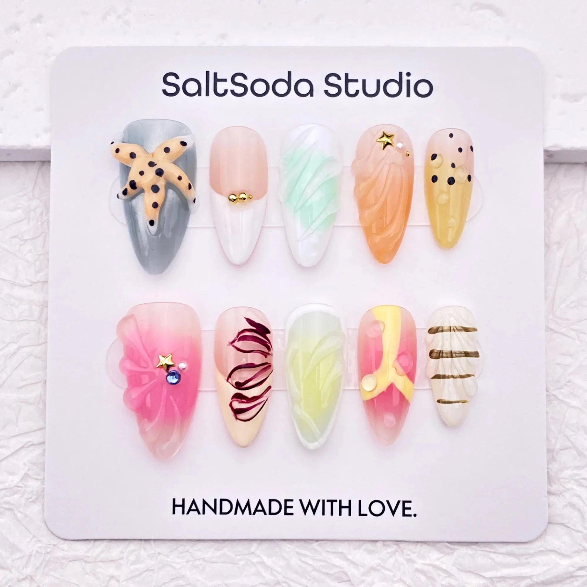 

3D starfish summer bright nail art, cute almond shaped French tip nail art, hand stamped nail art, reusable nails
