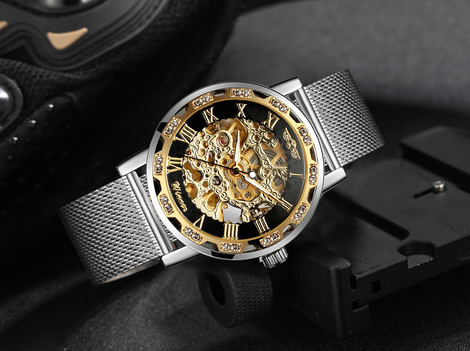 T-WINNER كلاسيكي فضي الأرقام الرومانية الرجال النقش الهيكل العظمي ساعة ميكانيكية مؤشرات مضيئة شبكة مرصعة بأحجار الراين الفرقة رجل ساعة