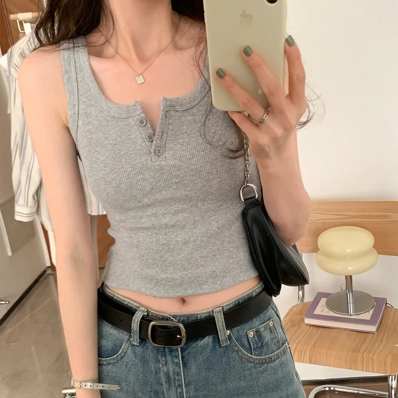

Small Sexy Short Camisole Top Worn Inside And Outside With Exposed Navel