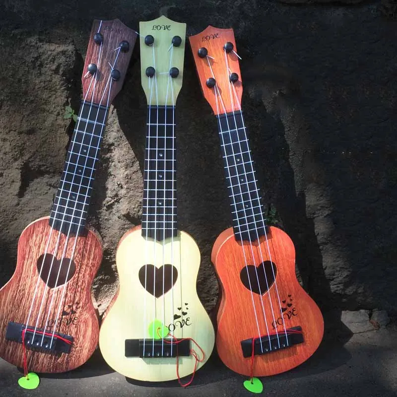 Mini ukelele de simulación de plástico para niños, guitarra pequeña para principiantes, instrumento Musical, juguetes educativos, regalos, 1 piezas