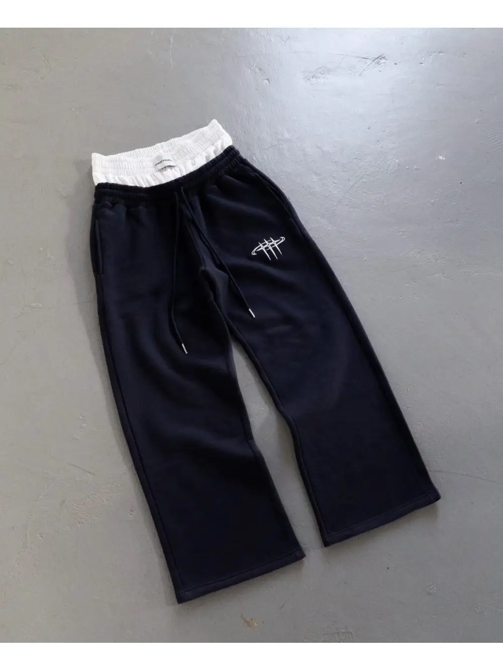 Pantaloni sportivi a doppia vita casual larghi hip-hop da strada retrò americani Pantaloni sportivi in due pezzi finti unisex