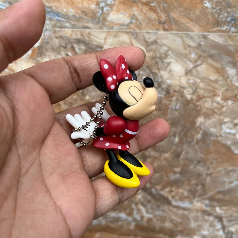 Authentieke Charlie Brown, Minnie en prinses Elsa-actiefiguren, perfect voor kinderverjaardagen en cadeaus.