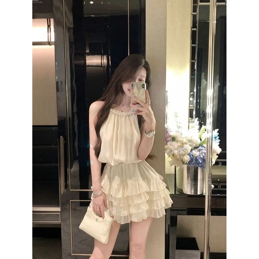 2025 Nieuwe Zomer Sexy Slanke Parel Jurk Damesmode Elegante Mouwloze Mini Jurk voor Vrouwen Vrouwelijke Kantoor Dame Hoge kwaliteit