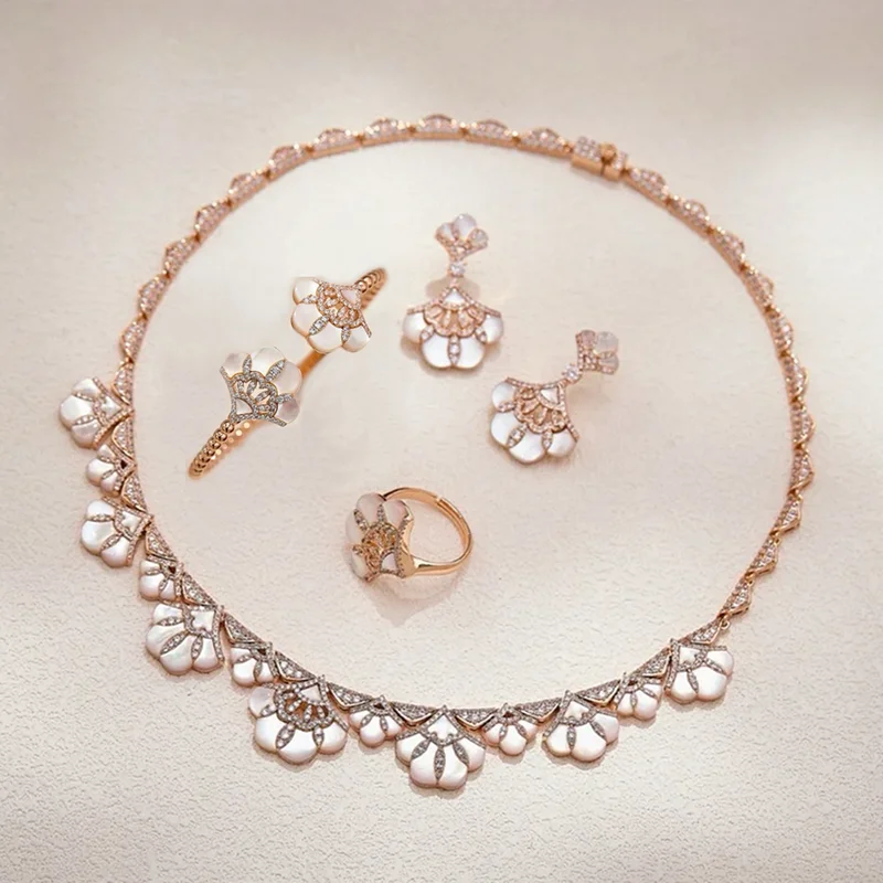 

Европейские и американские кольца, серьги, браслеты, ожерелья с инкрустацией из кубического циркония AAA, перламутра, малахита, бирюзы, ювелирные наборы для вечеринок.